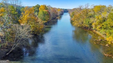 Experience a rare blend of privacy, acreage, and riverfront - photo 14