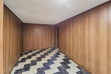 Welcome to this all-brick ranch home! The bright sunny living - photo 17