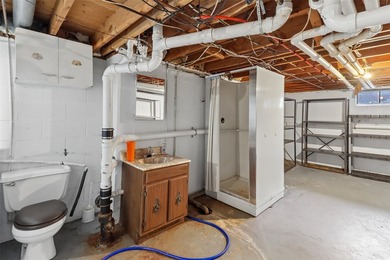 Welcome to this all-brick ranch home! The bright sunny living - photo 19