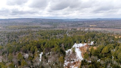 Tucked away in the heart of Maine's lake country, this raw - photo 10