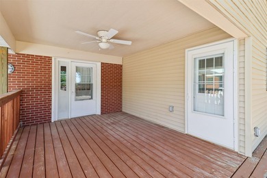 Welcome to this all-brick ranch home! The bright sunny living - photo 21