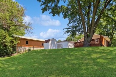 Welcome to this all-brick ranch home! The bright sunny living - photo 24