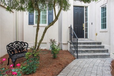 An exceptional townhome nestled within the gated enclave of - photo 2