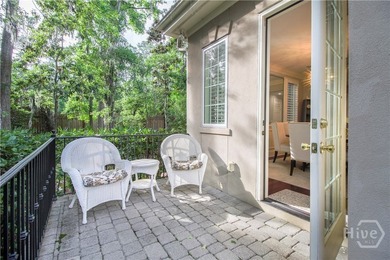 An exceptional townhome nestled within the gated enclave of - photo 4