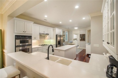 An exceptional townhome nestled within the gated enclave of - photo 6