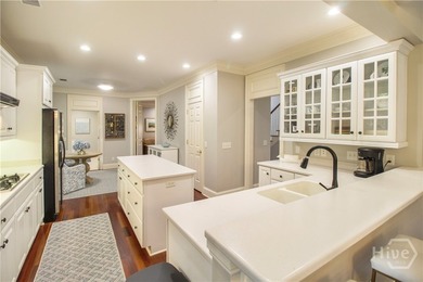An exceptional townhome nestled within the gated enclave of - photo 7