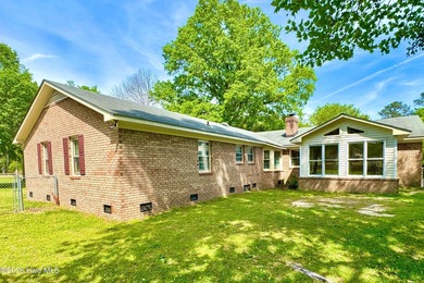 Opportunity with acreage, multiple structures, and income - photo 11