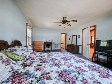 Opportunity with acreage, multiple structures, and income - photo 23