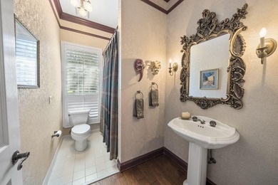 Tucked behind the gates of Bay Point, a grand Southern, Colonial - photo 34
