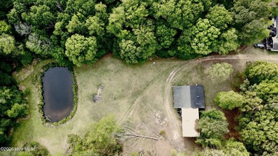 Opportunity with acreage, multiple structures, and income - photo 36
