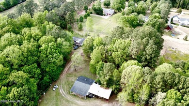 Opportunity with acreage, multiple structures, and income - photo 38