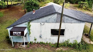 Opportunity with acreage, multiple structures, and income - photo 40