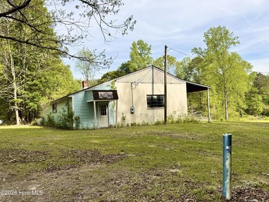 Opportunity with acreage, multiple structures, and income - photo 47