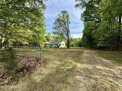 Opportunity with acreage, multiple structures, and income - photo 48