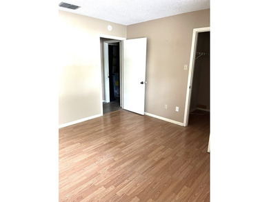 End unit with FULL GARAGE. Lots of huge oak trees and walking - photo 9