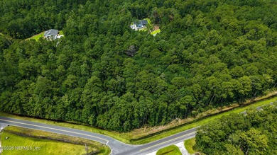 Approximately 1.98-acre wooded homesite located in the gated - photo 4