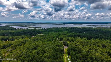 Approximately 1.98-acre wooded homesite located in the gated - photo 6