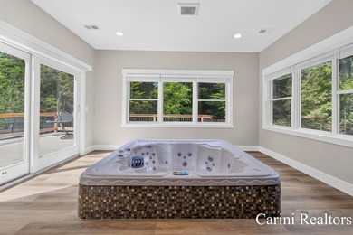 Nestled on a private wooded lot within a gated community, this - photo 22