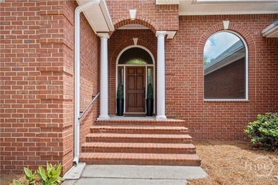 Welcome to this stunning full brick 4-bedroom, 3.5-bath home in - photo 4