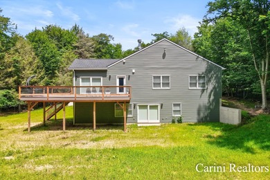 Nestled on a private wooded lot within a gated community, this - photo 50