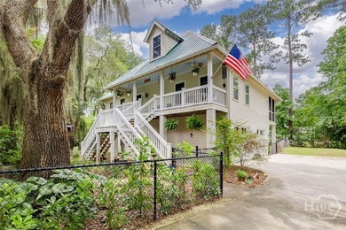 Tucked beneath swaying oaks and draped in coastal charm, 3120 - photo 1