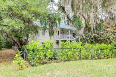 Tucked beneath swaying oaks and draped in coastal charm, 3120 - photo 4