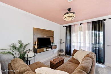 Beautifully updated 2 bedroom, 1 bath two-story corner unit - photo 5