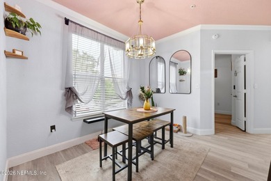 Beautifully updated 2 bedroom, 1 bath two-story corner unit - photo 7