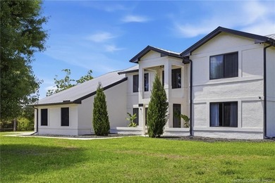 Experience privacy and luxury in one of Palm City's most - photo 9
