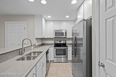 BEST-PRICED TOWNHOME IN THE GATED ISLANDER COMMUNITY ON - photo 4