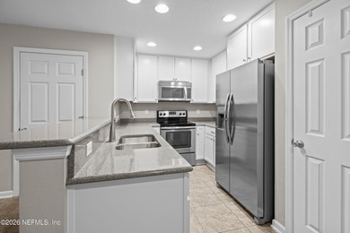 BEST-PRICED TOWNHOME IN THE GATED ISLANDER COMMUNITY ON - photo 5