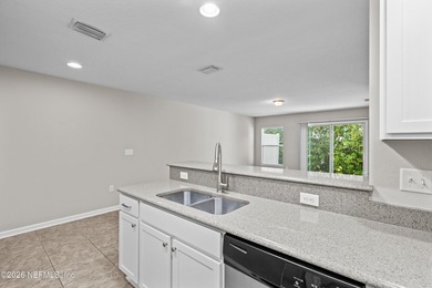 BEST-PRICED TOWNHOME IN THE GATED ISLANDER COMMUNITY ON - photo 7