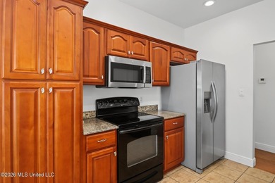 Move-in ready and just minutes from the beach! This beautiful - photo 7