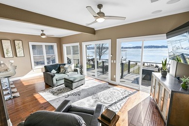 50 feet of prime frontage on Pewaukee Lake. Taken down to the - photo 1
