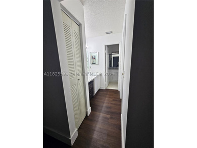 This charming 2-bedroom, 2-bathroom unit offers an open-concept - photo 11