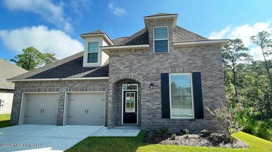 This stunning brick home immediately catches the eye with its - photo 1