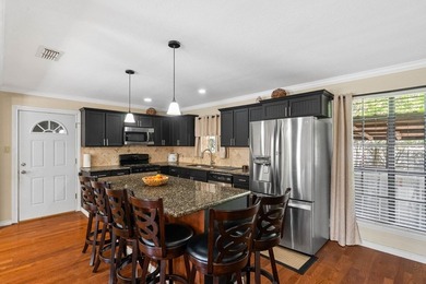 This fully furnished, move-in ready home features 3 bedrooms and - photo 10