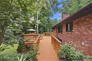 FLAWLESSLY updated 4 sided brick ranch on a GORGEOUS level lot - photo 34