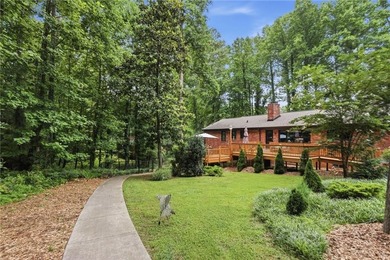 FLAWLESSLY updated 4 sided brick ranch on a GORGEOUS level lot - photo 36