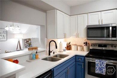 Experience the best of low-maintenance living in the gated - photo 3