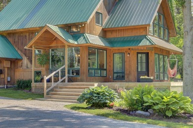 Set along the scenic west shore of South Hero among upscale - photo 12