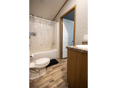 This charming 3-bedroom, 2 full bath single-wide home offers - photo 23