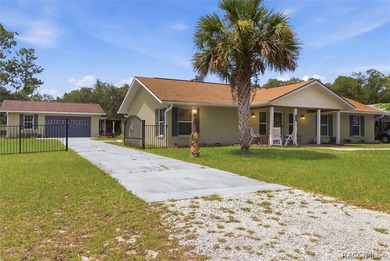 Welcome home to this inviting three-bedroom, two-bath with - photo 2