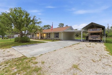 Welcome home to this inviting three-bedroom, two-bath with - photo 4