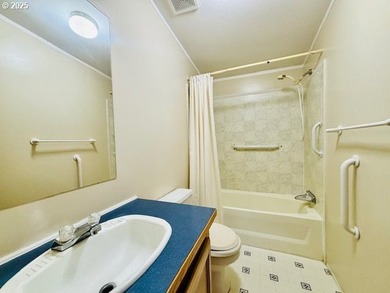 Tucked into the welcoming Coast Village community, this charming - photo 12