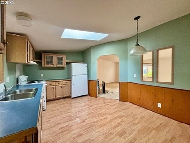 Tucked into the welcoming Coast Village community, this charming - photo 16