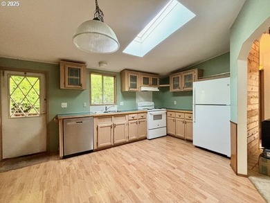 Tucked into the welcoming Coast Village community, this charming - photo 17