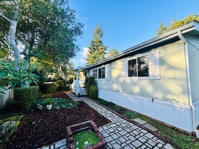 Tucked into the welcoming Coast Village community, this charming - photo 25