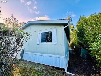 Tucked into the welcoming Coast Village community, this charming - photo 26