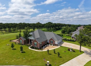 Stunning custom home on .72 acres surrounded by beautiful golf - Lake Home For Sale in Kemp, Texas